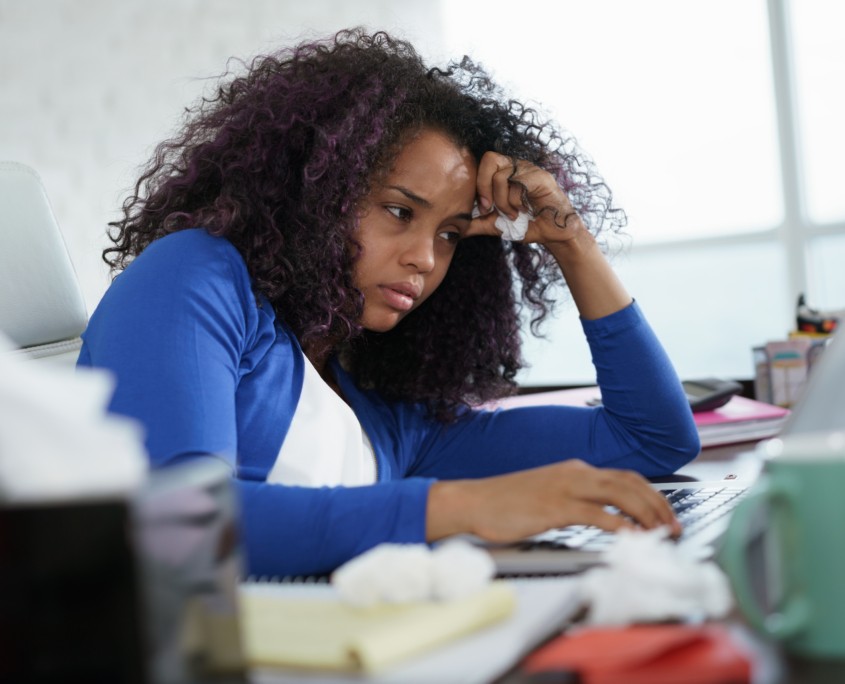 Black Woman Working from Home And Sneezing For Cold
